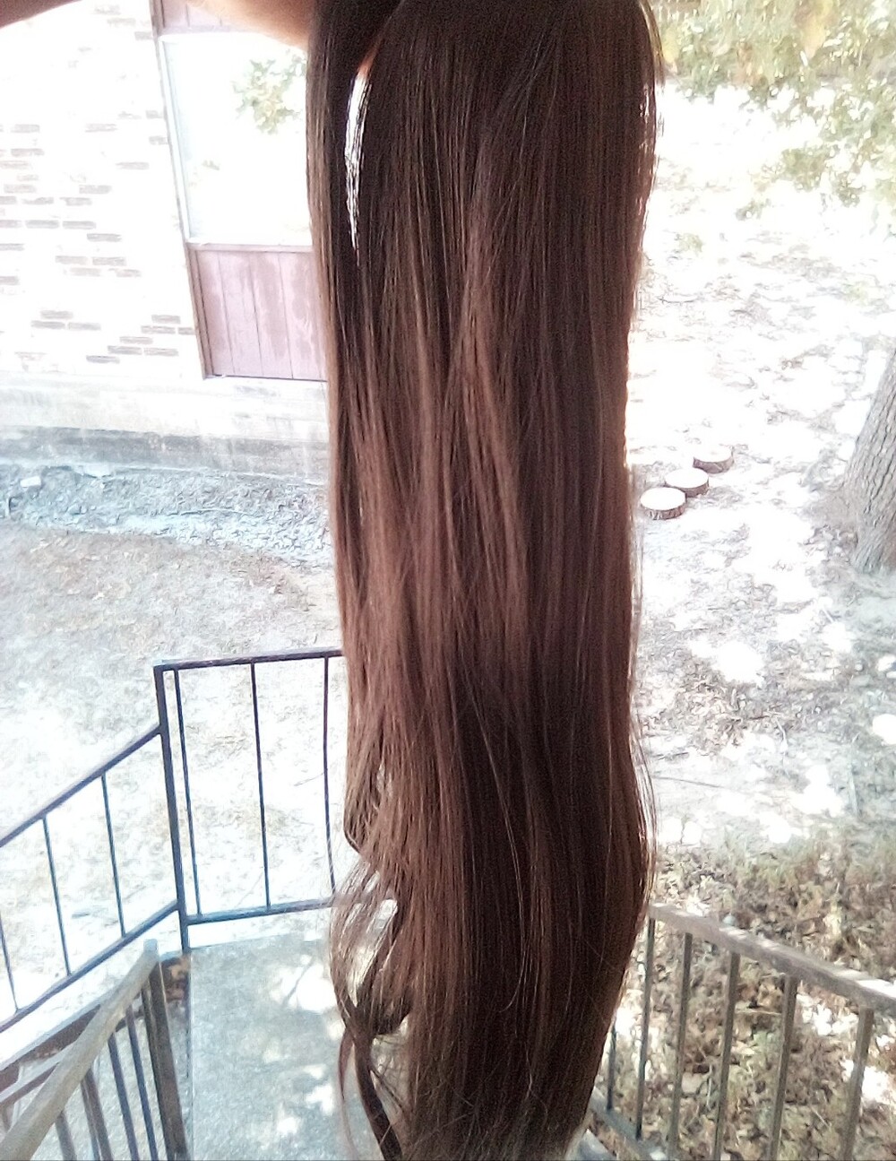 Long Straight Clip-In Hair Extension in Natural Brown